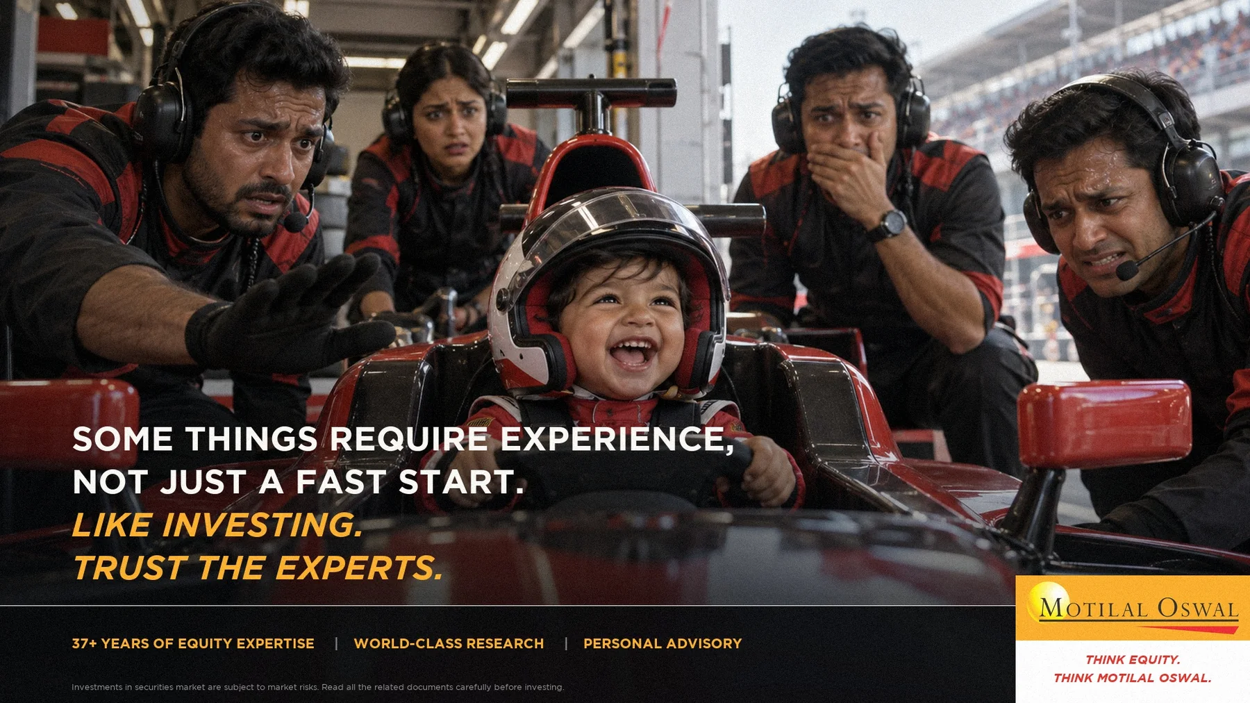 A toddler in a Formula 1 car